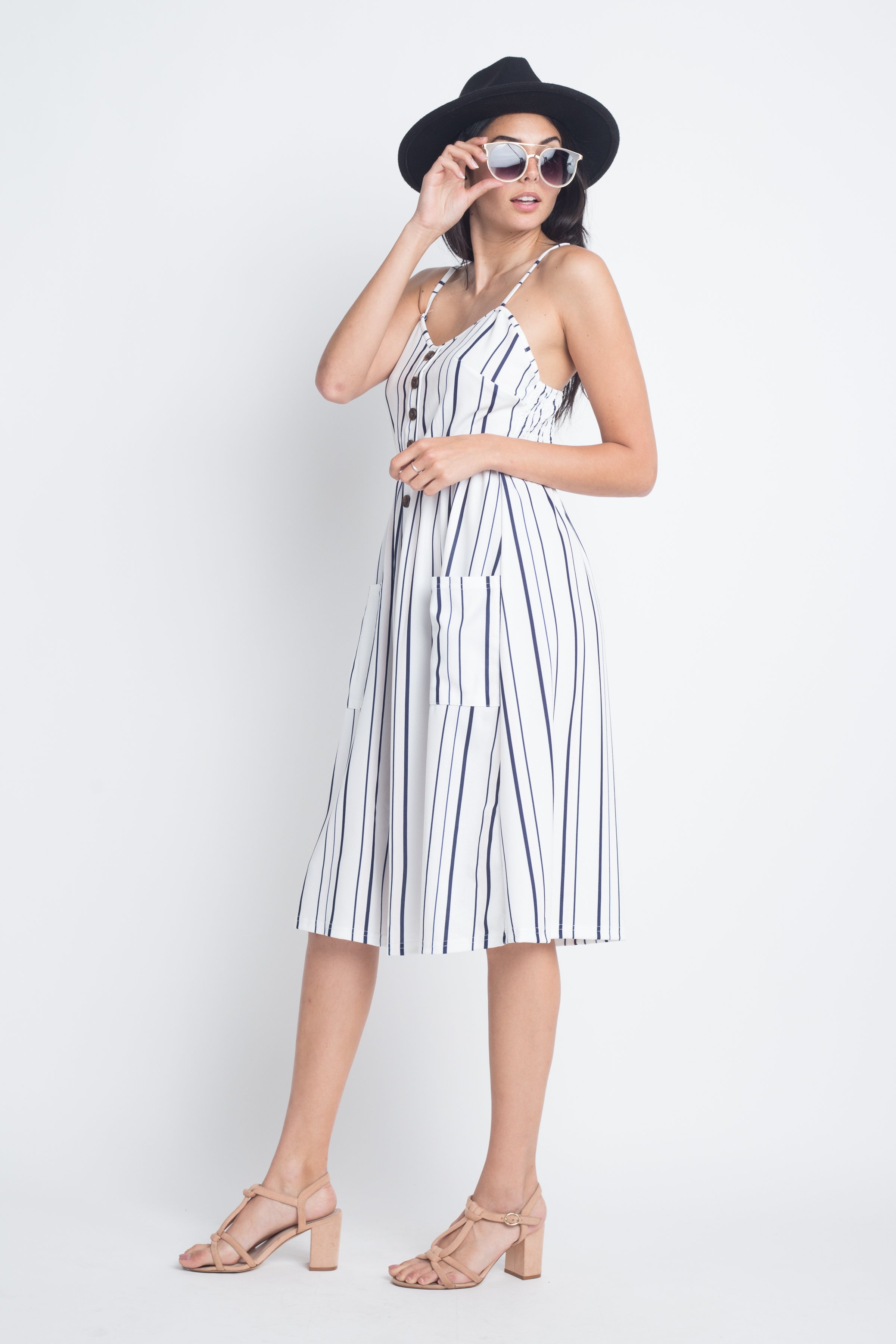 A stylish Women's Striped Button Midi Sleeveless Dress featuring vertical stripes and a button-down front, perfect for summer outings.