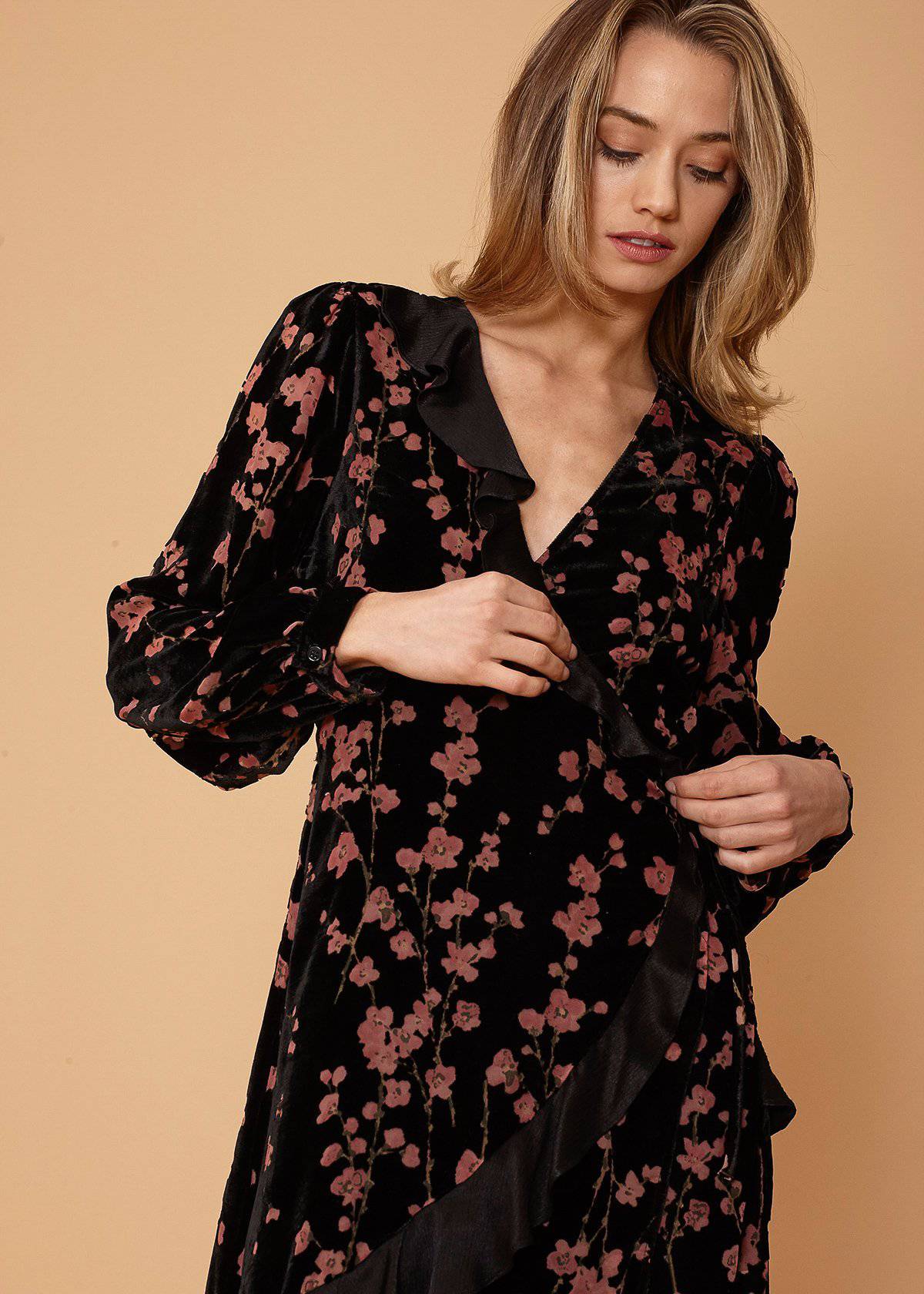 Women's Velvet Asymmetric Wrap Dress featuring a Falling Floral design with a waist tie and asymmetric hem.