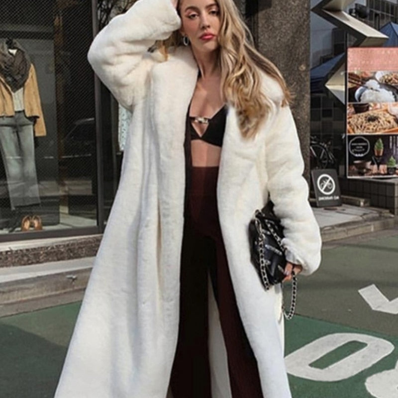 2022 New Female Winter Plush Thick Warm Loose Women Faux Rabbit Fur coat in a stylish design with a turn-down collar and covered button closure.