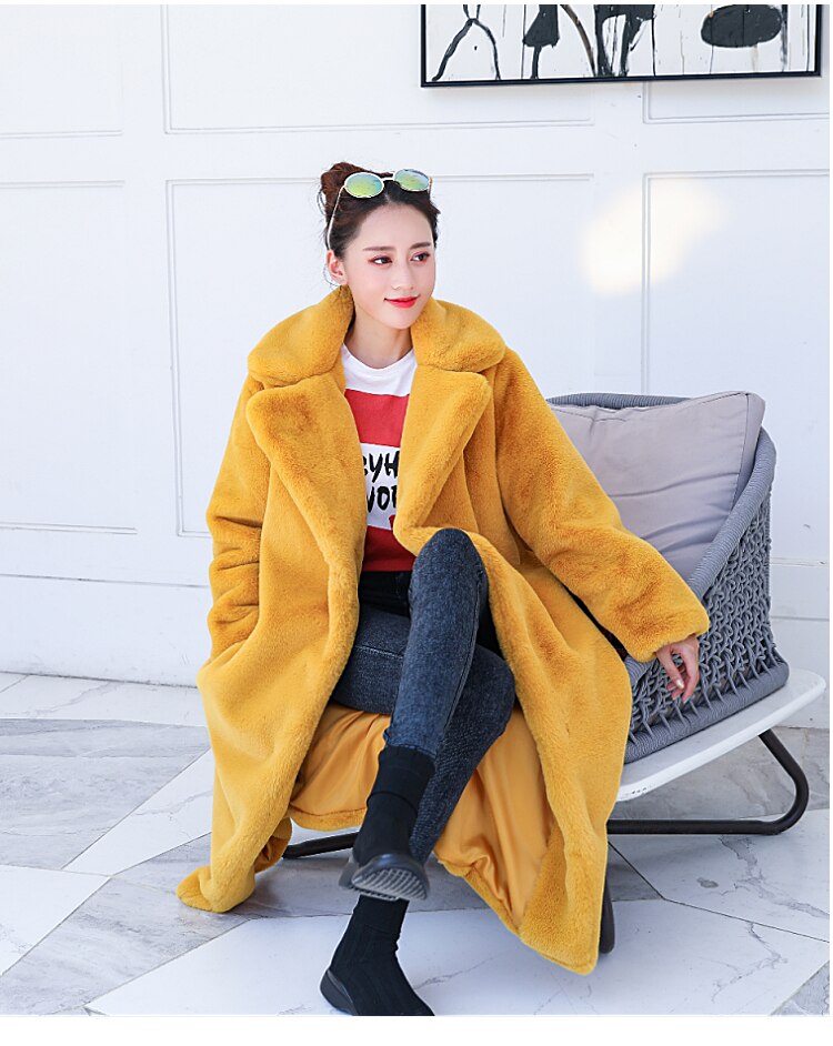 2022 New Female Winter Plush Thick Warm Loose Women Faux Rabbit Fur coat in a stylish design with a turn-down collar and covered button closure.