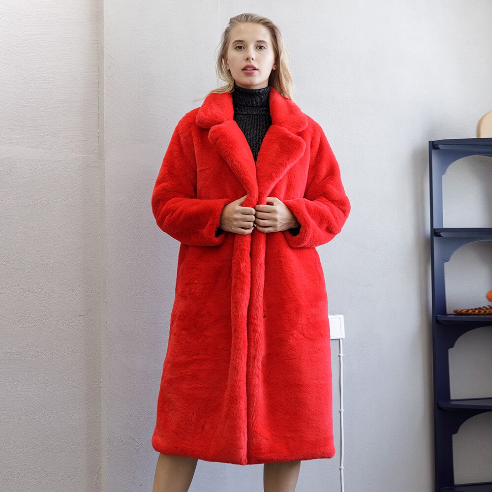 2022 New Female Winter Plush Thick Warm Loose Women Faux Rabbit Fur coat in a stylish design with a turn-down collar and covered button closure.