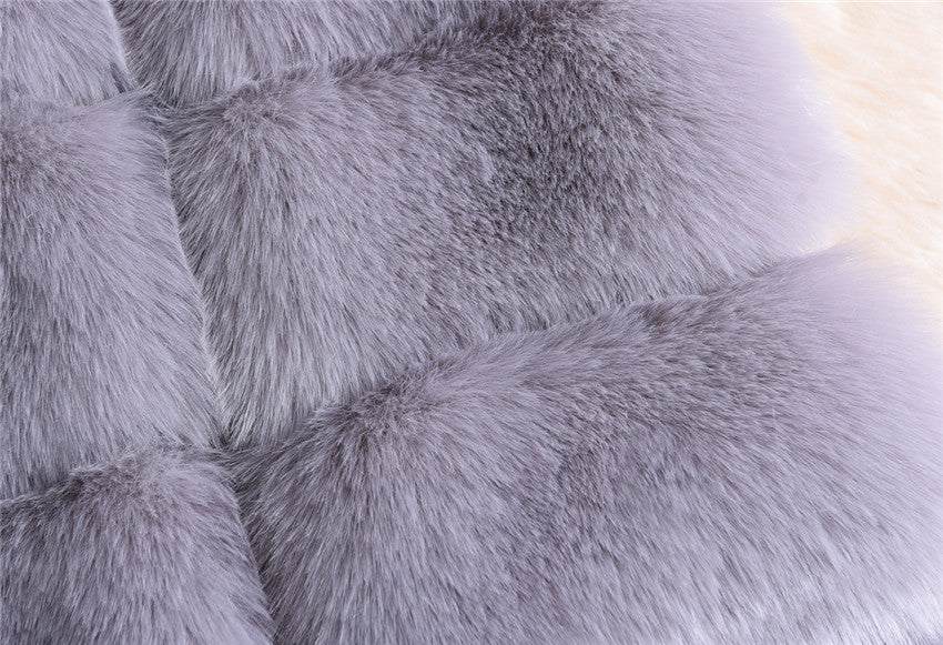 2022 Winter Sleeveless Artificial Fox Fur Coat Gilet in solid color with hood, showcasing luxurious faux fur texture and elegant design.