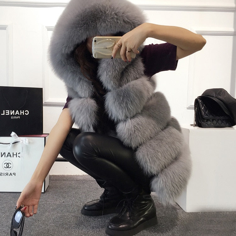 2022 Winter Sleeveless Artificial Fox Fur Coat Gilet in solid color with hood, showcasing luxurious faux fur texture and elegant design.