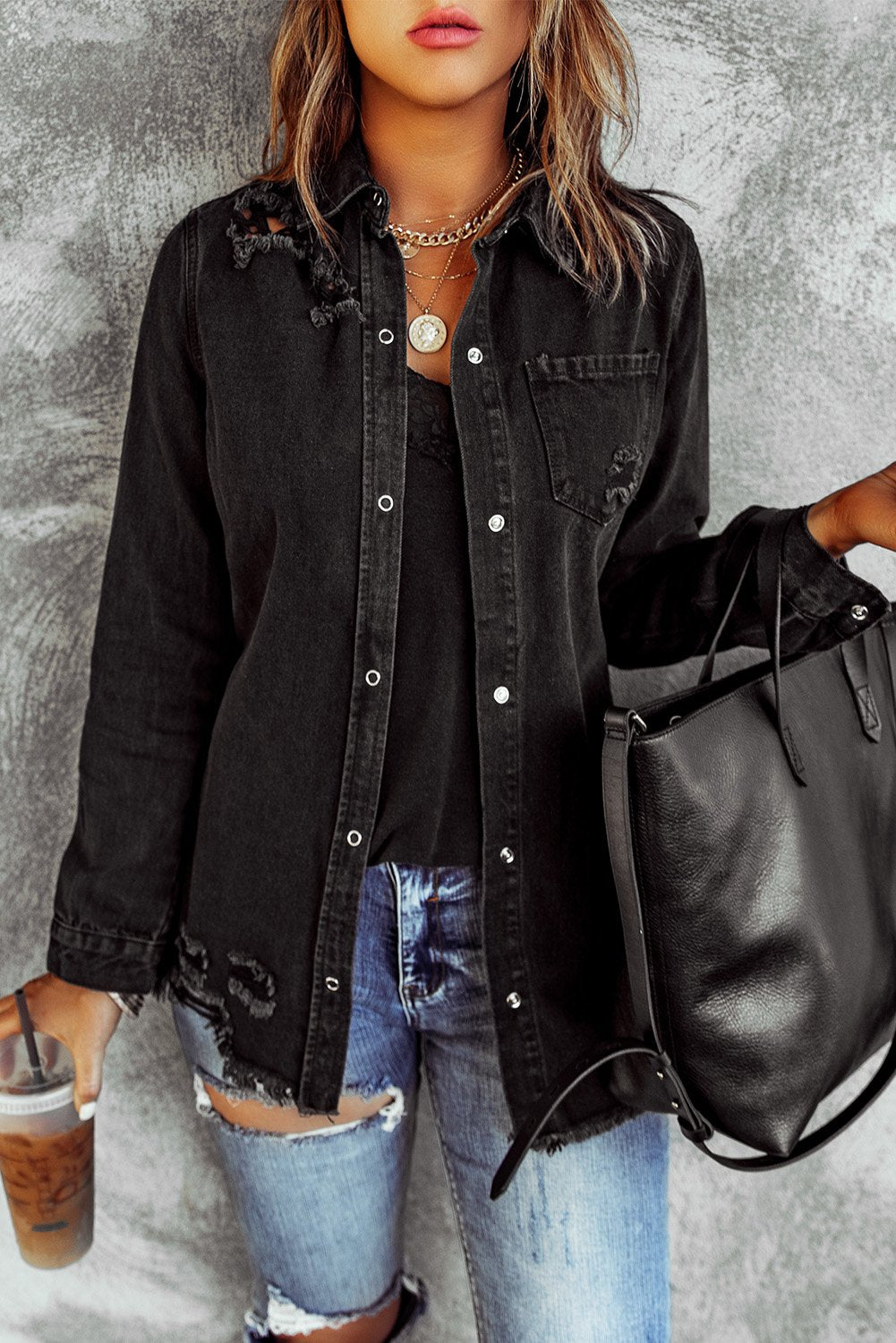 Black Ripped Denim Jacket featuring a stylish distressed design, elegant collar, and full sleeves, perfect for casual wear.