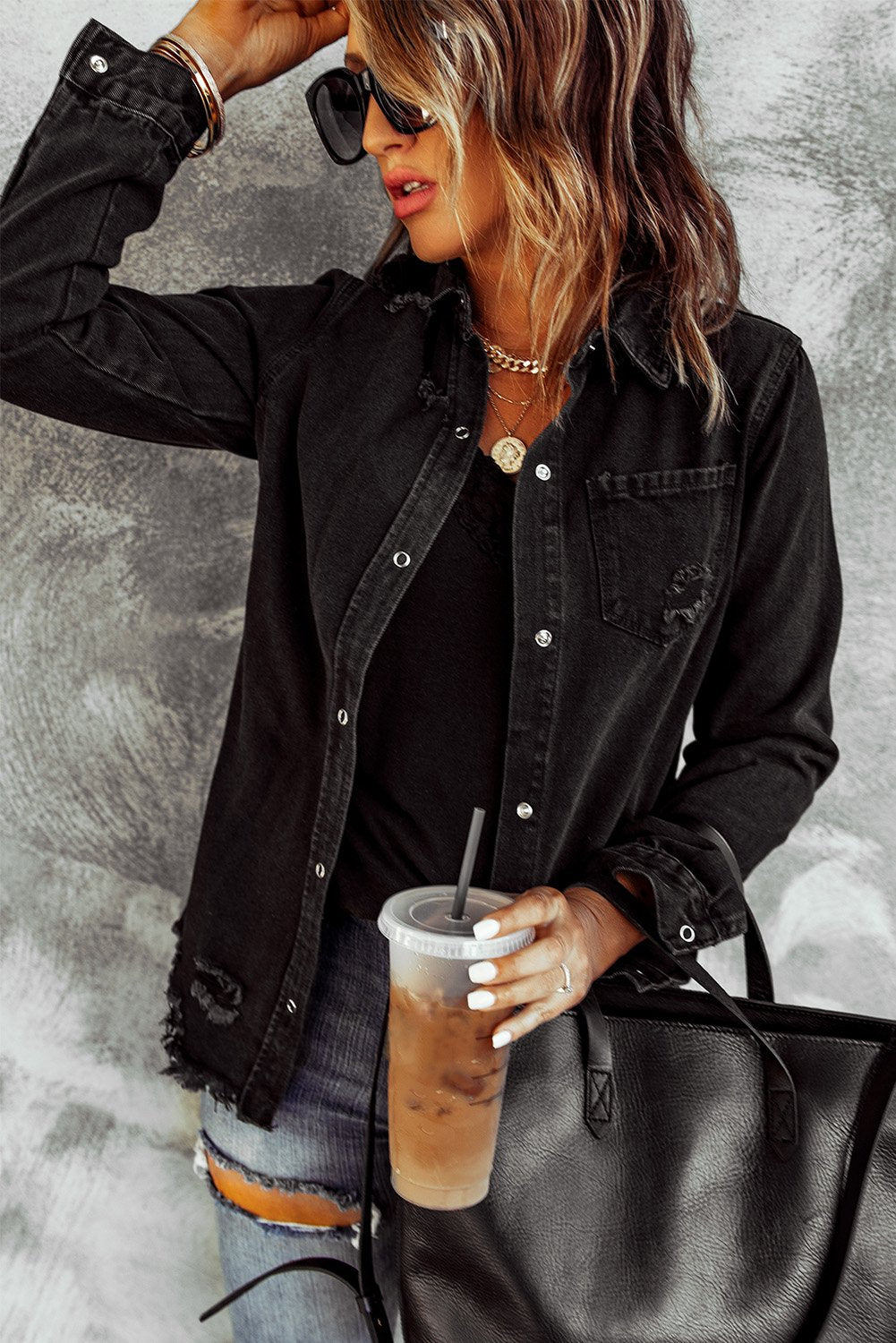 Black Ripped Denim Jacket featuring a stylish distressed design, elegant collar, and full sleeves, perfect for casual wear.