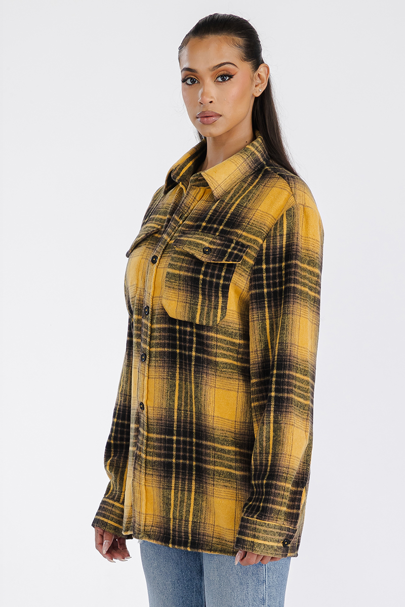 A stylish oversized flannel shacket for women, featuring a button closure and chest pockets, made from soft brushed fabric.