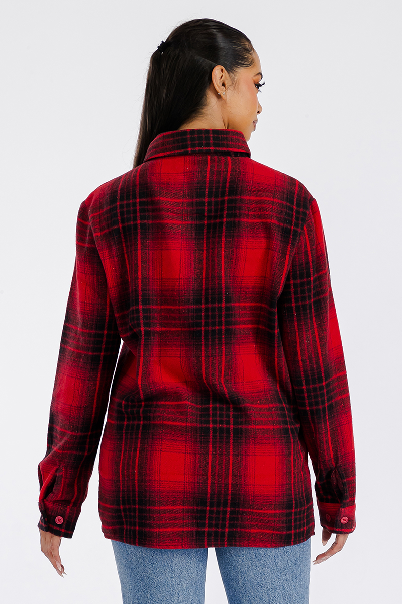 A stylish oversized flannel shacket for women, featuring a button closure and chest pockets, made from soft brushed fabric.