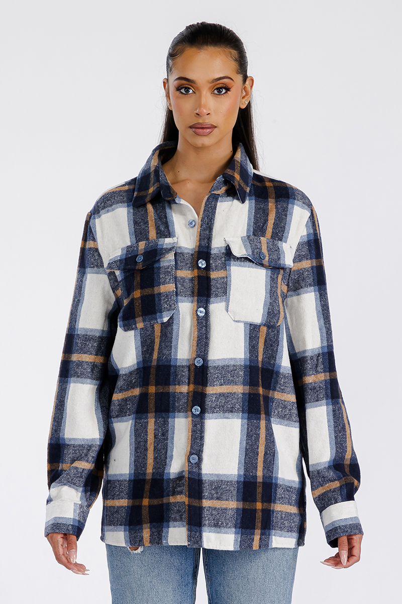 A stylish oversized flannel shacket in soft brushed fabric, featuring button closure and chest pockets, perfect for layering.