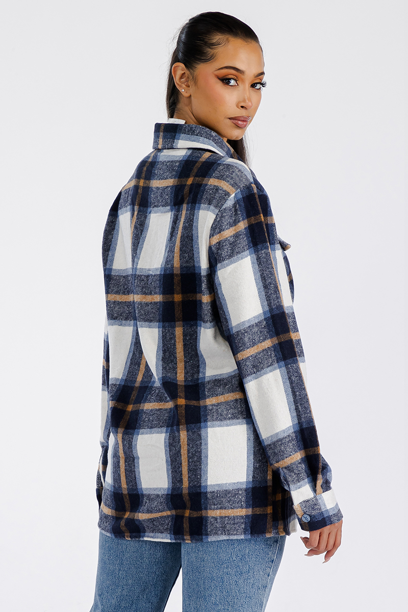 A stylish oversized flannel shacket in soft brushed fabric, featuring button closure and chest pockets, perfect for layering.