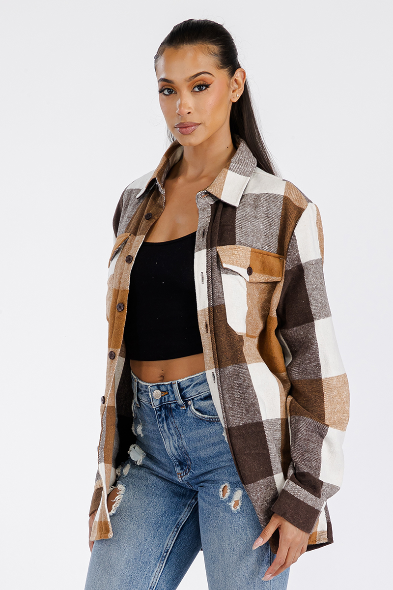 A stylish oversized flannel shacket for women, featuring a button closure and chest pockets, made from soft brushed fabric.