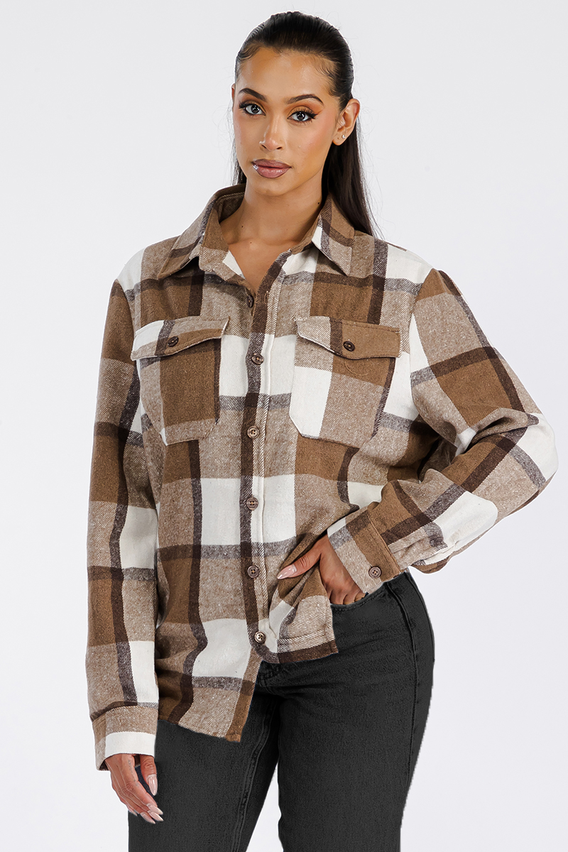 A stylish oversized flannel shacket for women, featuring a button closure and chest pockets, made from soft brushed fabric.