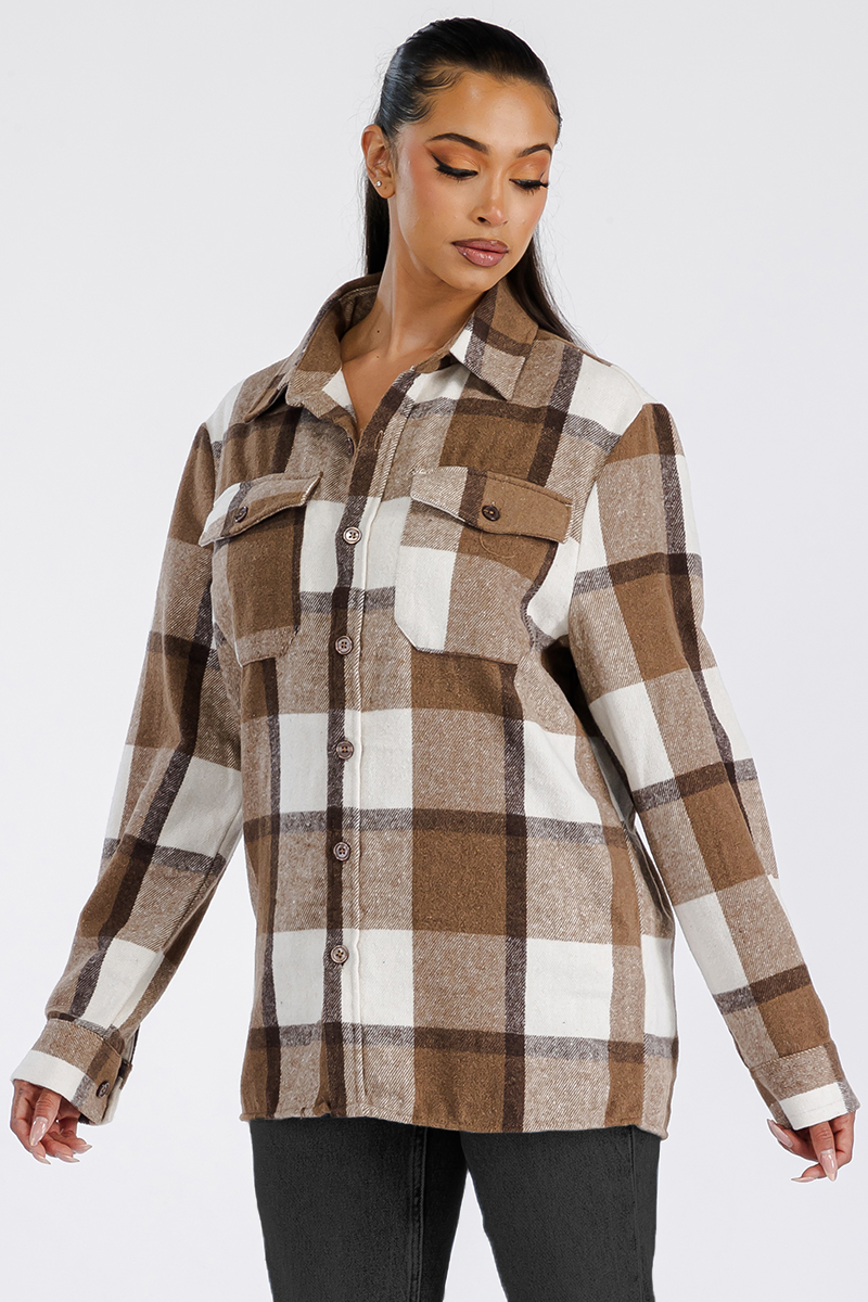 A stylish oversized flannel shacket for women, featuring a button closure and chest pockets, made from soft brushed fabric.