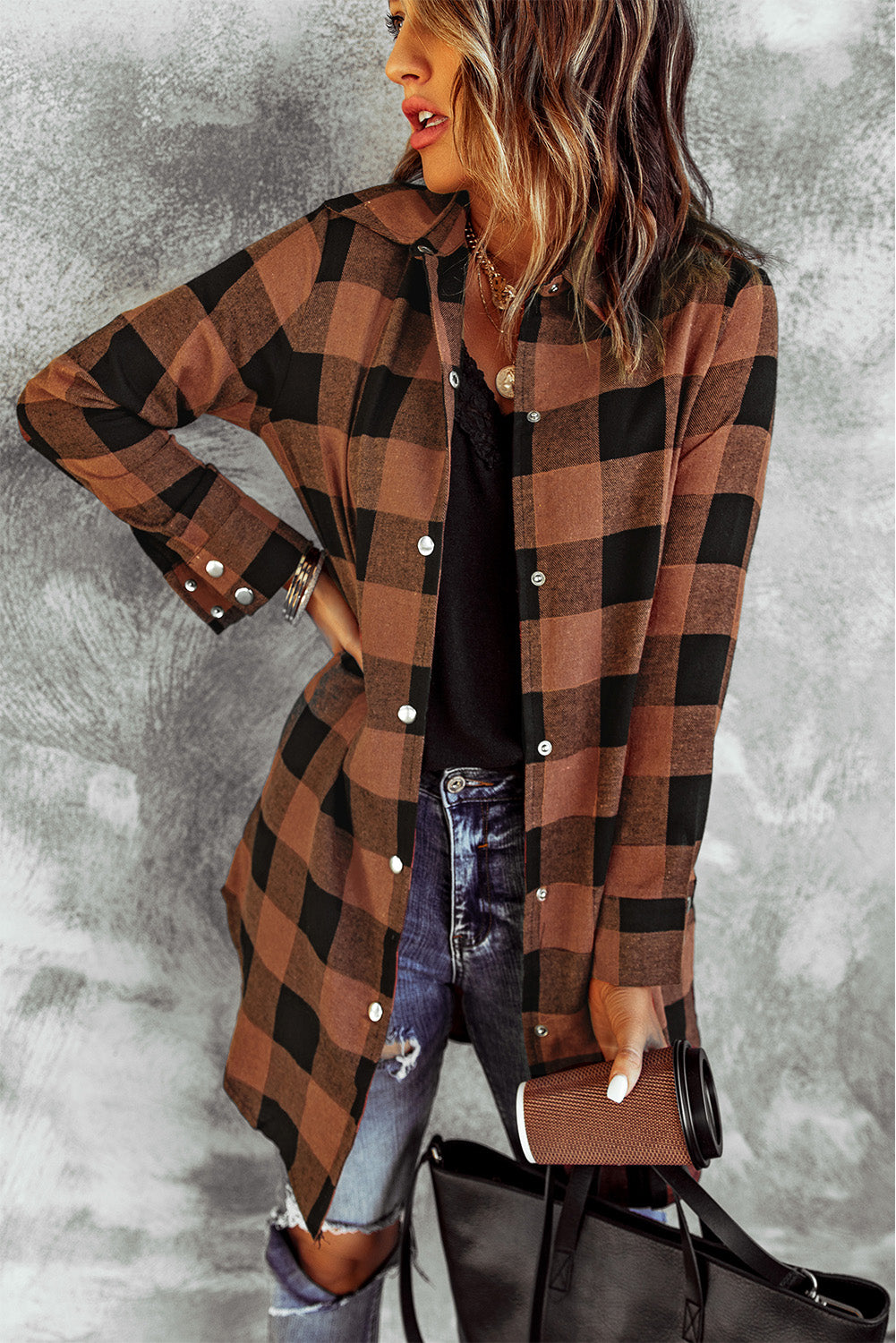 Brown plaid shacket with long sleeves and turn-down collar, perfect for winter layering.