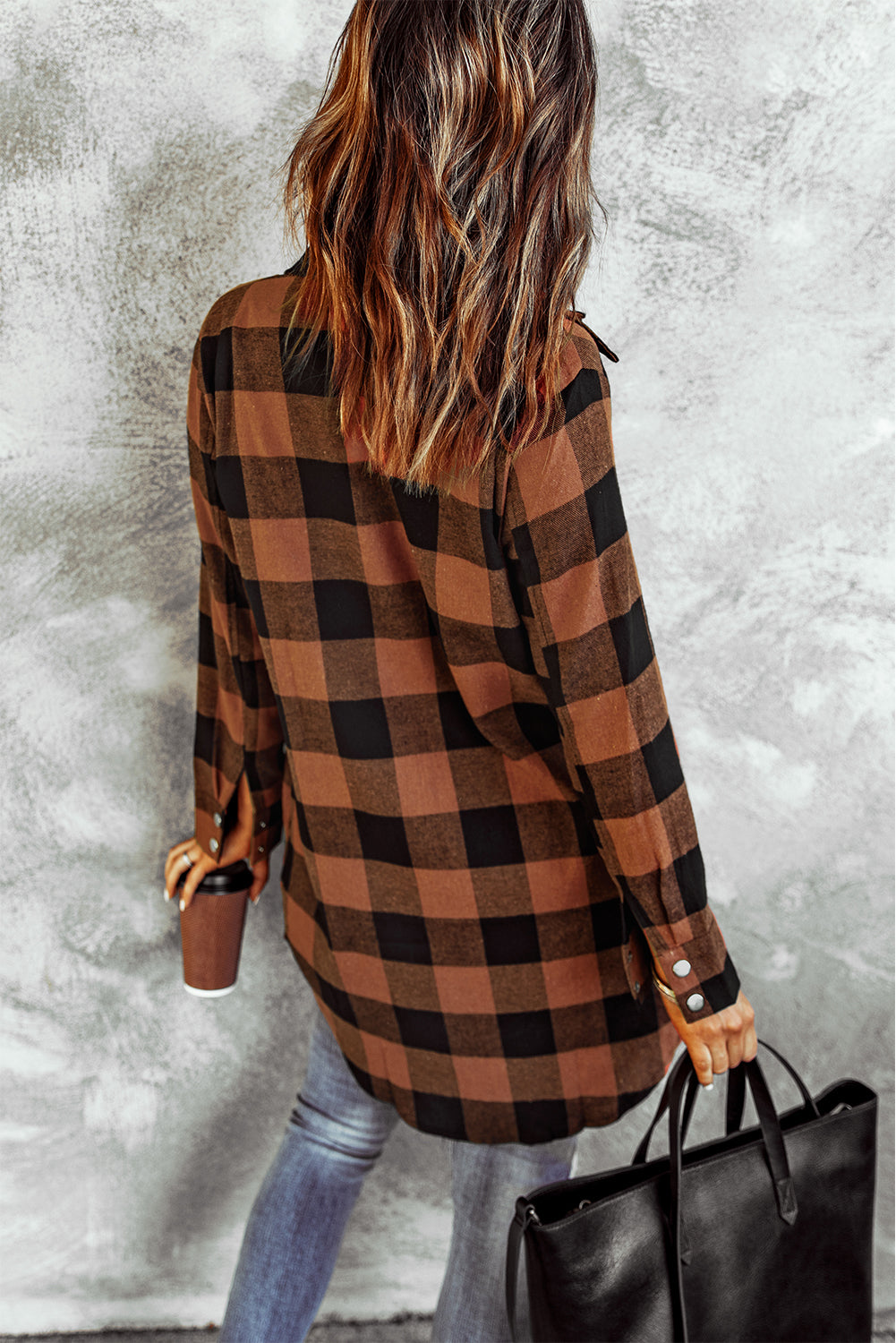 Brown plaid shacket with long sleeves and turn-down collar, perfect for winter layering.