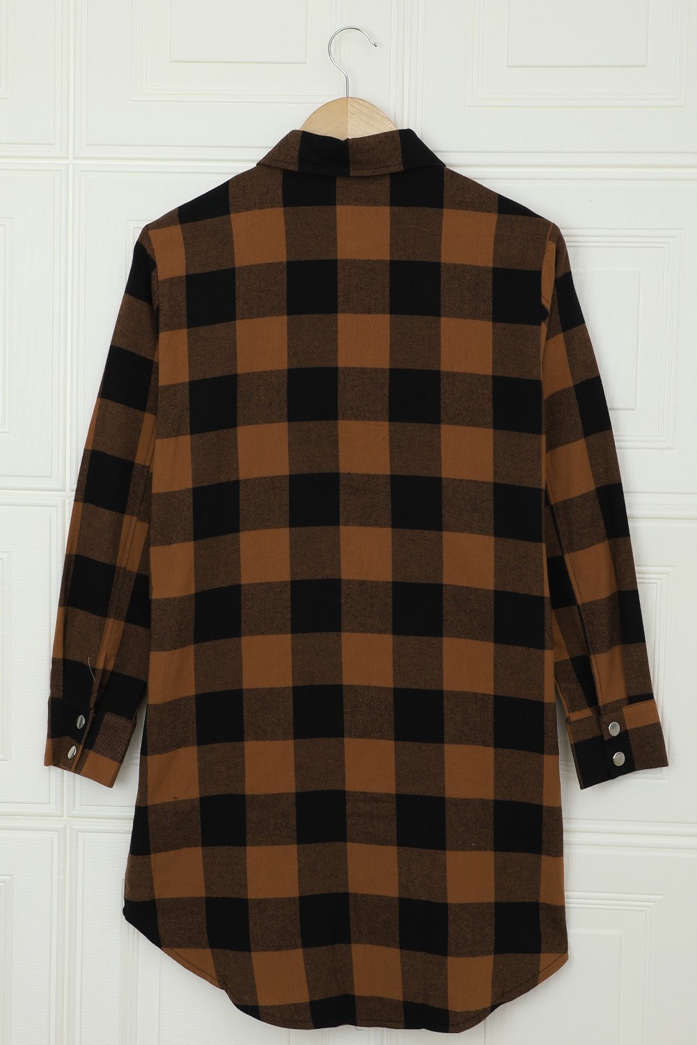 Brown plaid shacket with long sleeves and turn-down collar, perfect for winter layering.