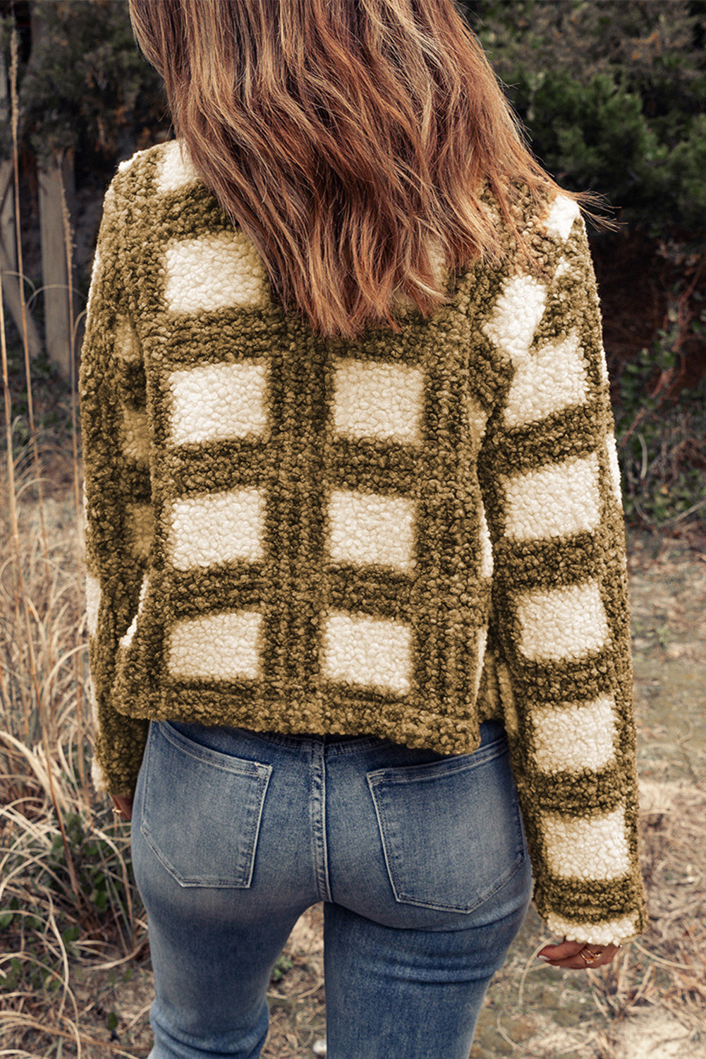 A stylish Brown Plaid Sherpa Jacket featuring a classic plaid pattern, lapel collar, and long sleeves, perfect for winter wear.