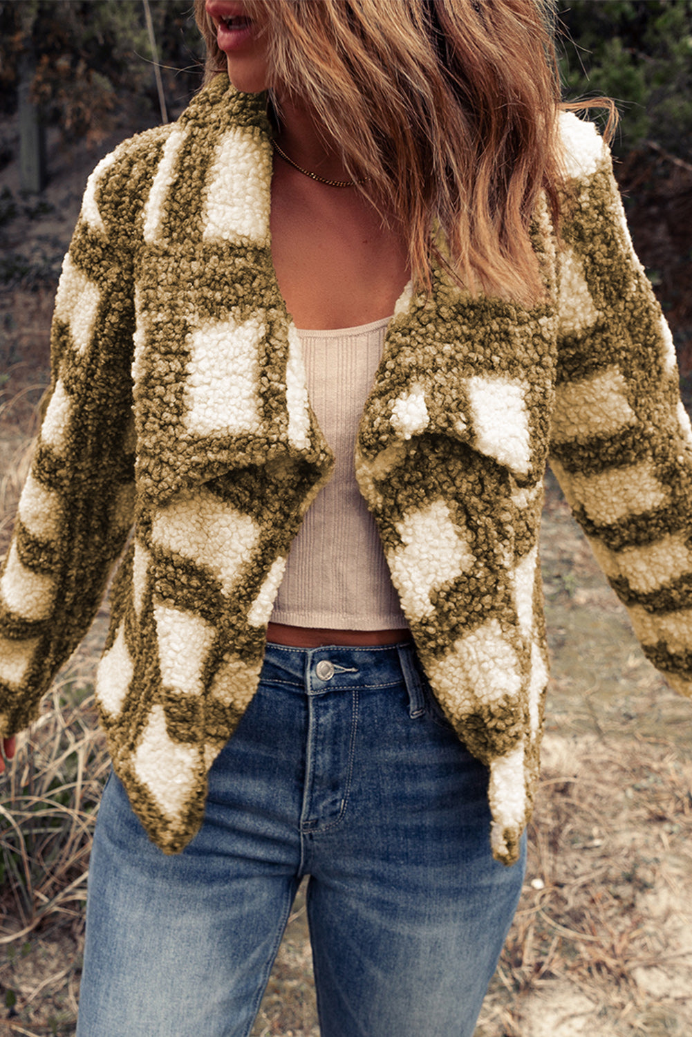 A stylish Brown Plaid Sherpa Jacket featuring a classic plaid pattern, lapel collar, and long sleeves, perfect for winter wear.