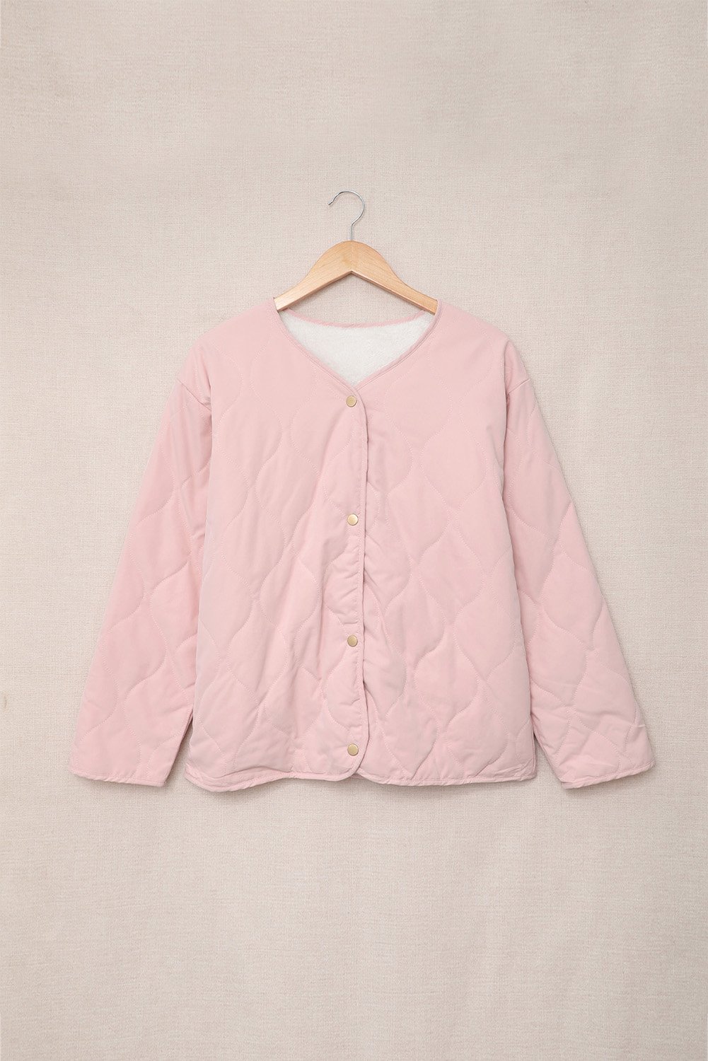 A stylish Buttoned Double-sided Coat in various colors, showcasing its soft fabric and button closure.