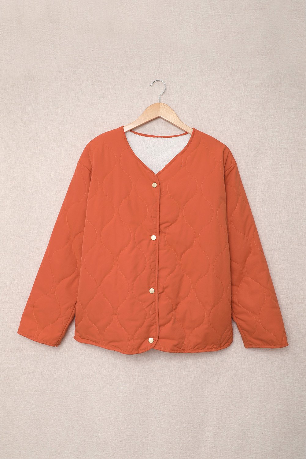 A stylish Buttoned Double-sided Coat in various colors, showcasing its soft fabric and button closure.