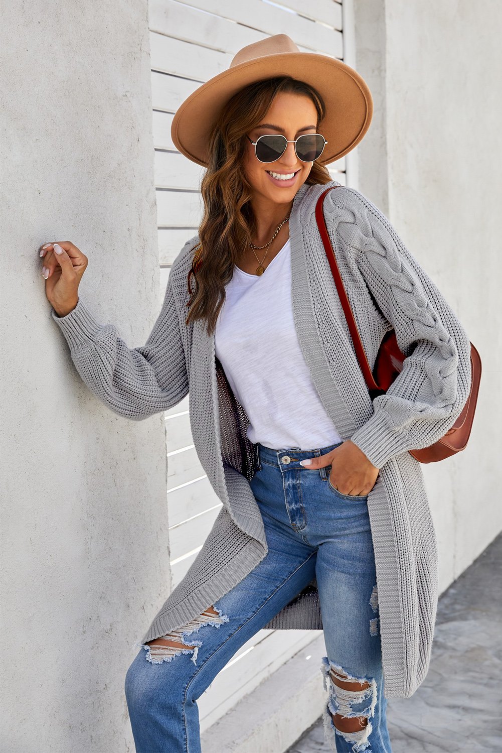 A stylish gray Cable Sleeve Long Cardigan with chunky sleeves, open front design, and a cozy fit, perfect for winter wear.