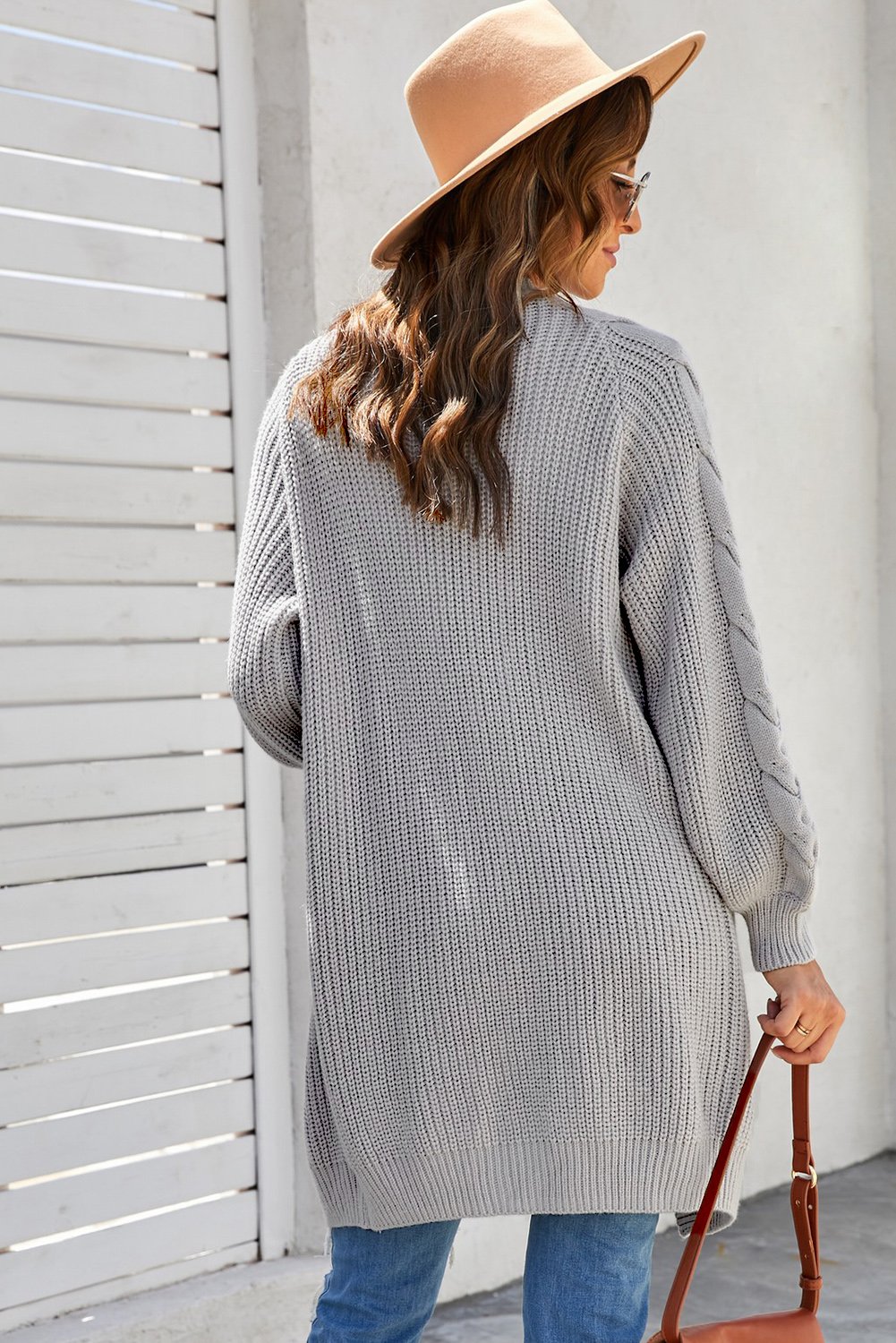 A stylish gray Cable Sleeve Long Cardigan with chunky sleeves, open front design, and a cozy fit, perfect for winter wear.