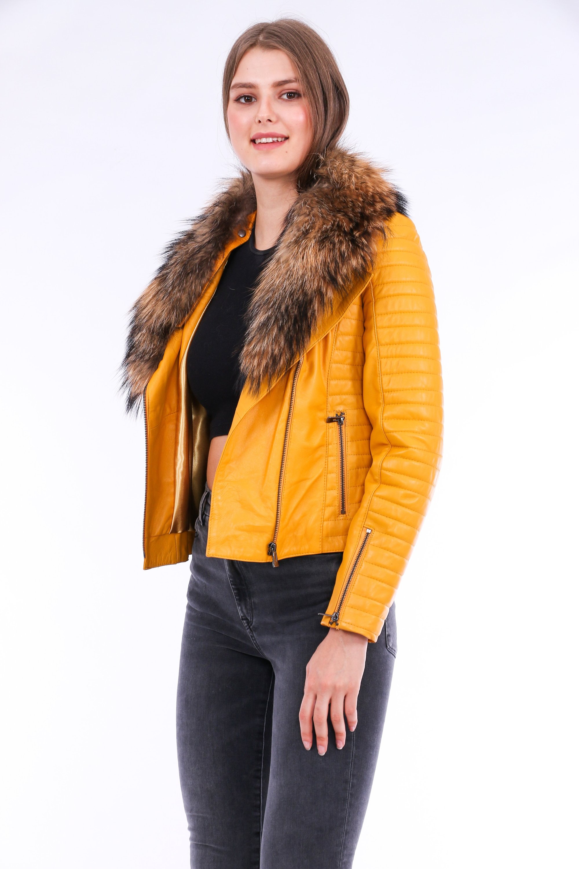 Cana Leather Biker Jacket in vibrant yellow with zipper cuff details and detachable fox fur collar, showcasing premium genuine sheepskin craftsmanship.