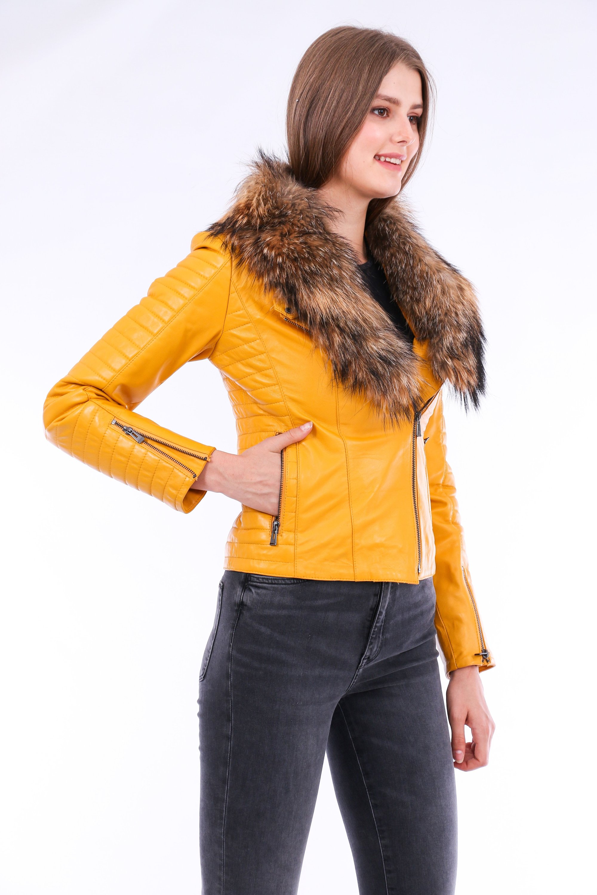 Cana Leather Biker Jacket in vibrant yellow with zipper cuff details and detachable fox fur collar, showcasing premium genuine sheepskin craftsmanship.