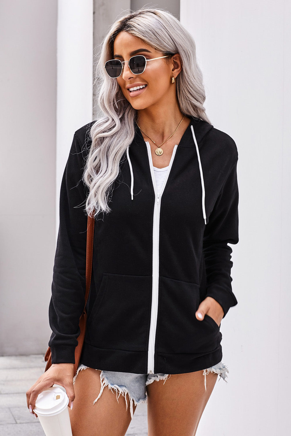 Casual Black Zip-up Hoodie Jacket featuring a contrast white metallic zipper and white circular drawcords, made from soft lightweight material.