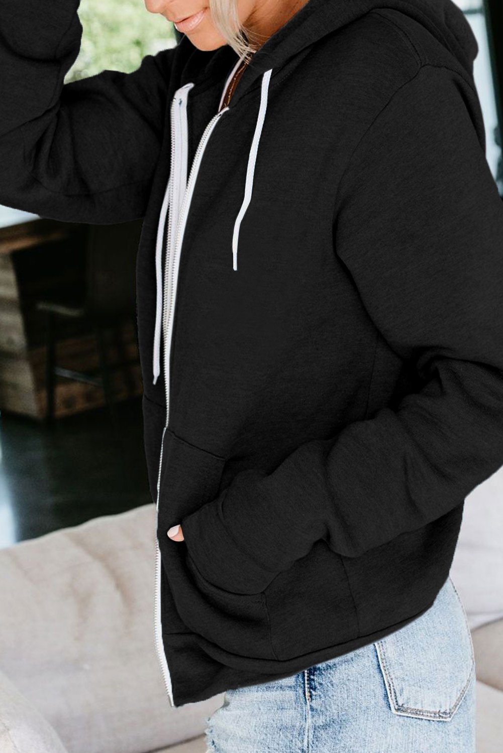 Casual Black Zip-up Hoodie Jacket featuring a contrast white metallic zipper and white circular drawcords, made from soft lightweight material.