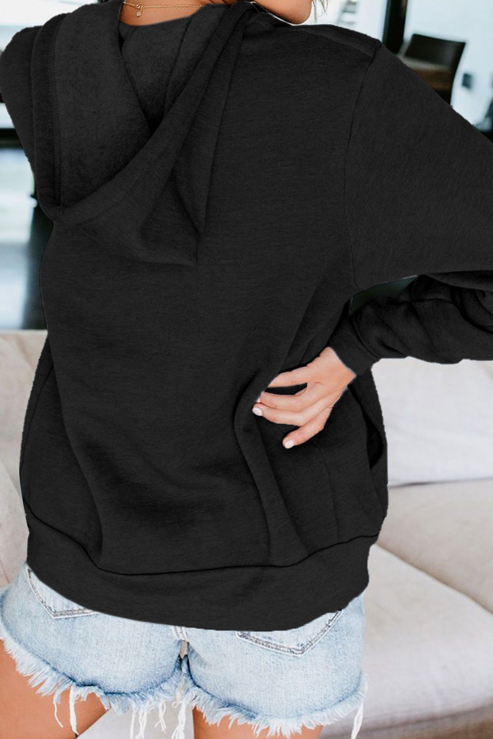 Casual Black Zip-up Hoodie Jacket featuring a contrast white metallic zipper and white circular drawcords, made from soft lightweight material.