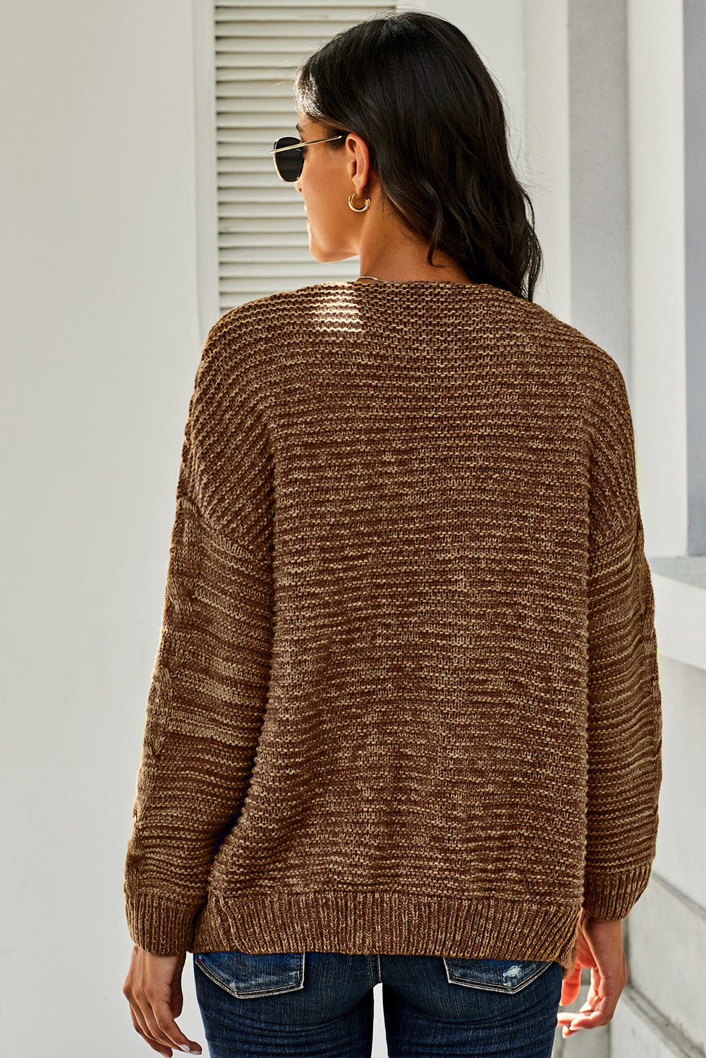 Casual brown chunky knit cardigan with long sleeves and open front design, perfect for winter layering.