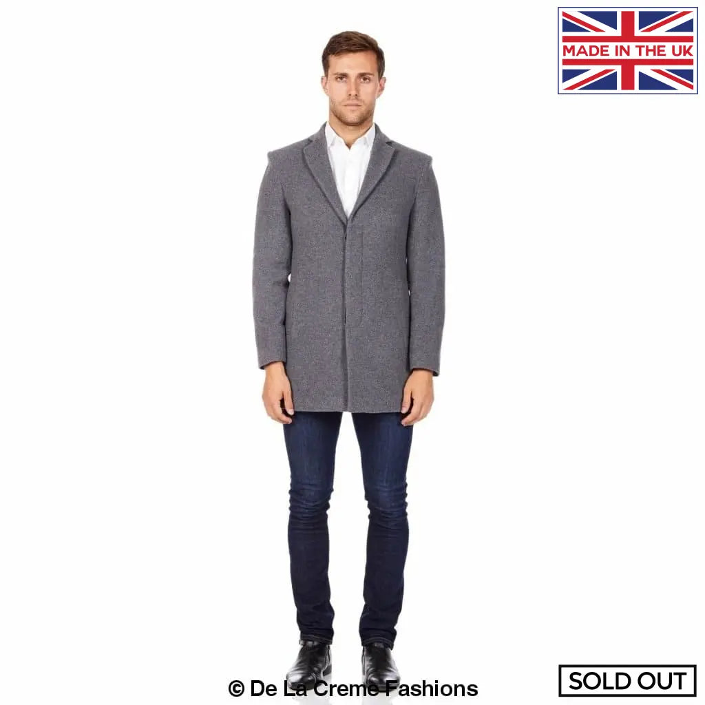 De La Creme MAN Wool Blend Covert Winter Coat in black, showcasing its elegant design and buttoned fastening.