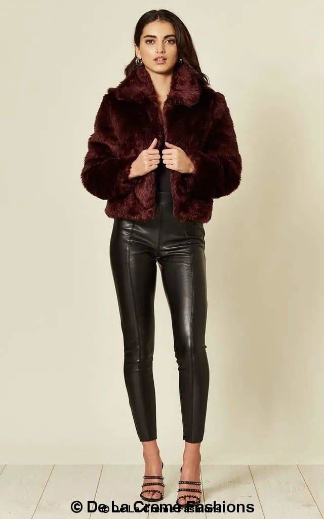 De La Creme Women's Faux Fur Cropped Aviator Bomber in Black, showcasing luxurious faux fur and cropped design.