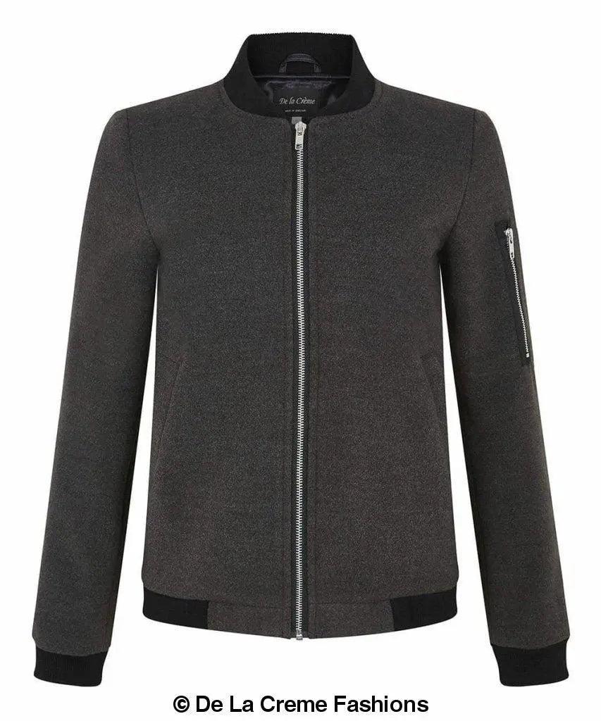 De La Creme Women's Long Sleeve Varsity Bomber Jacket in Black, showcasing its stylish design and high-quality fabric.