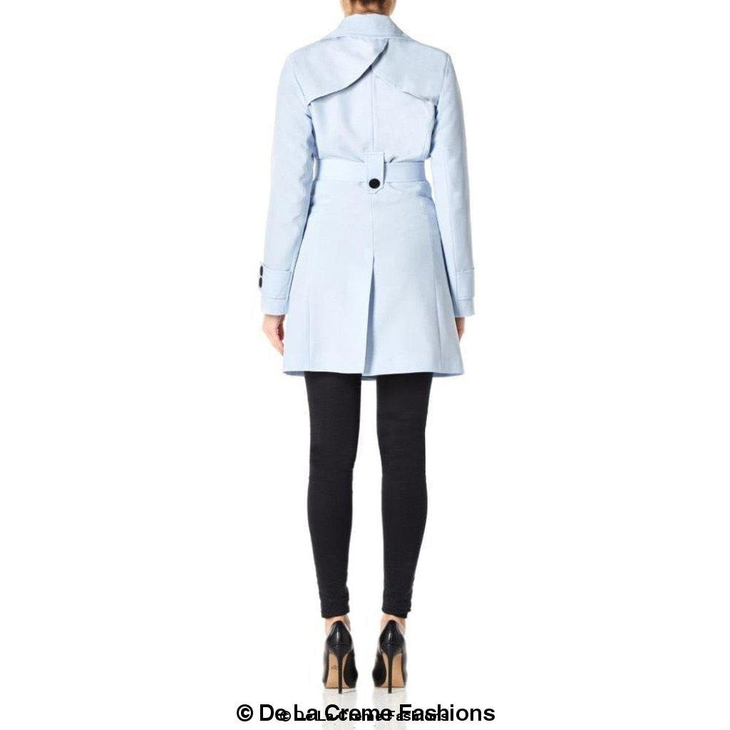 De La Creme Women's Mid Length Belted Mac Coat in black, featuring double-breasted fastening and a stylish belt.