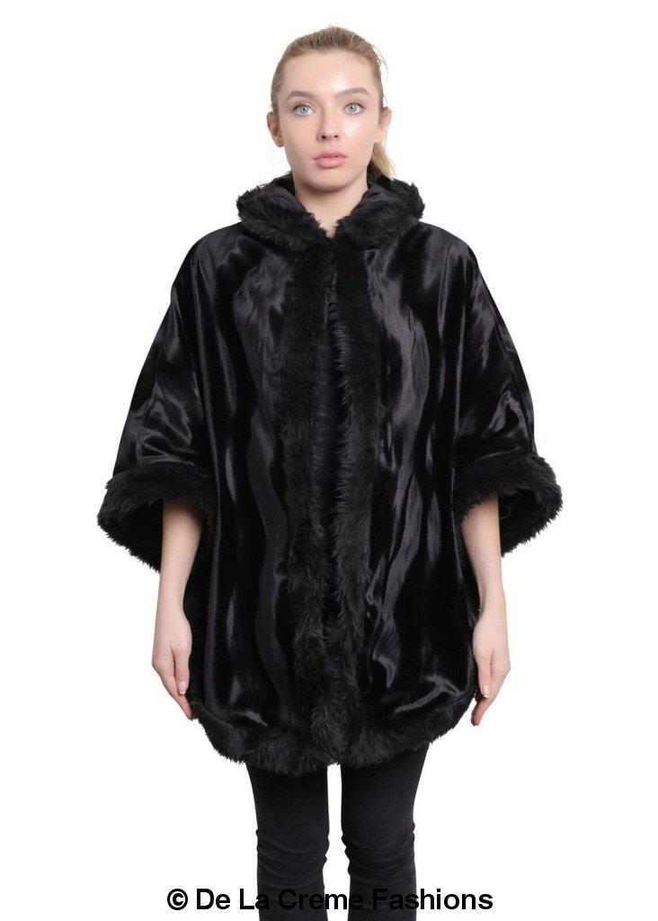 De La Creme Women's Tribal Print Fur Lined Hooded Cape in various colors, showcasing its luxurious design and cozy fur lining.