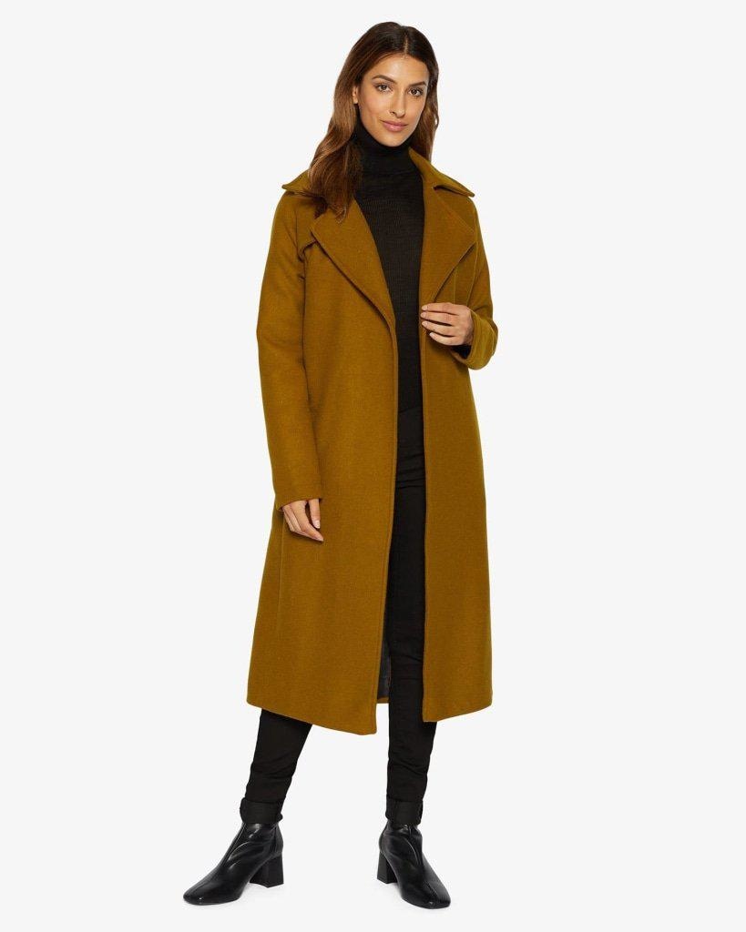 Diana Wrap Around Duster Coat featuring a waterfall lapel collar, open front design, and a stylish belt, made from a luxurious wool and cashmere blend.