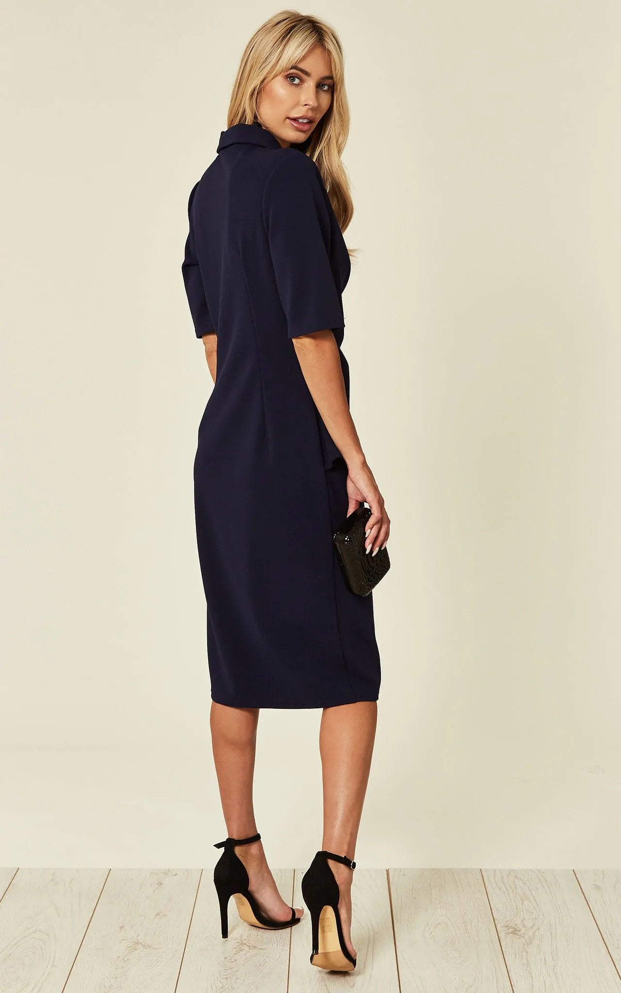 Diane Wrap Blazer Dress featuring a sophisticated blazer top and flattering wrap design, perfect for any occasion.