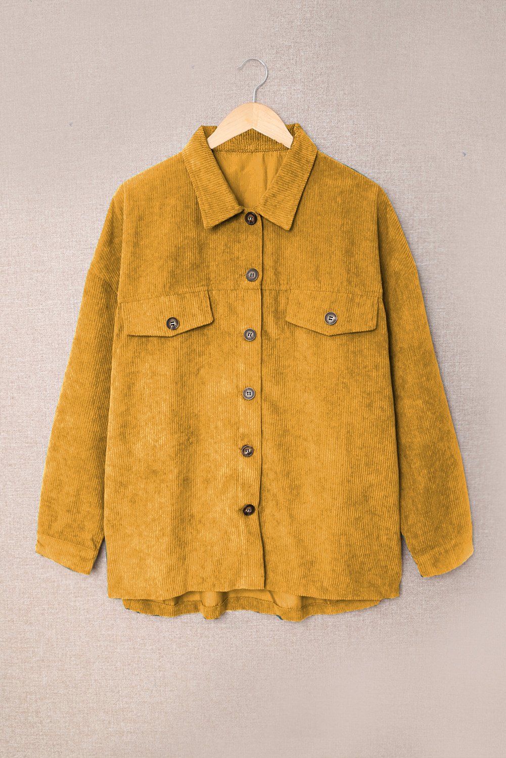 A stylish Fall Corduroy Shirt Coat in vibrant colors, featuring a turn-down collar and button-up design, perfect for autumn and winter wear.