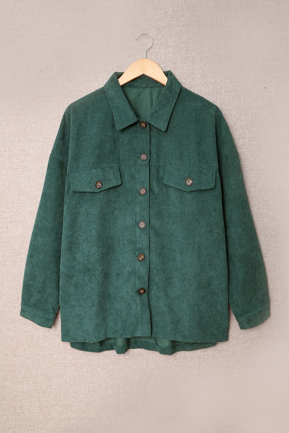 A stylish Fall Corduroy Shirt Coat in vibrant colors, featuring a turn-down collar and button-up design, perfect for autumn and winter wear.