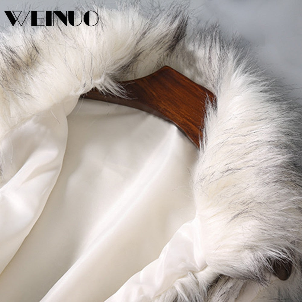 A luxurious faux fur vest with a standing collar, showcasing a natural color and sleeveless design, perfect for stylish layering.