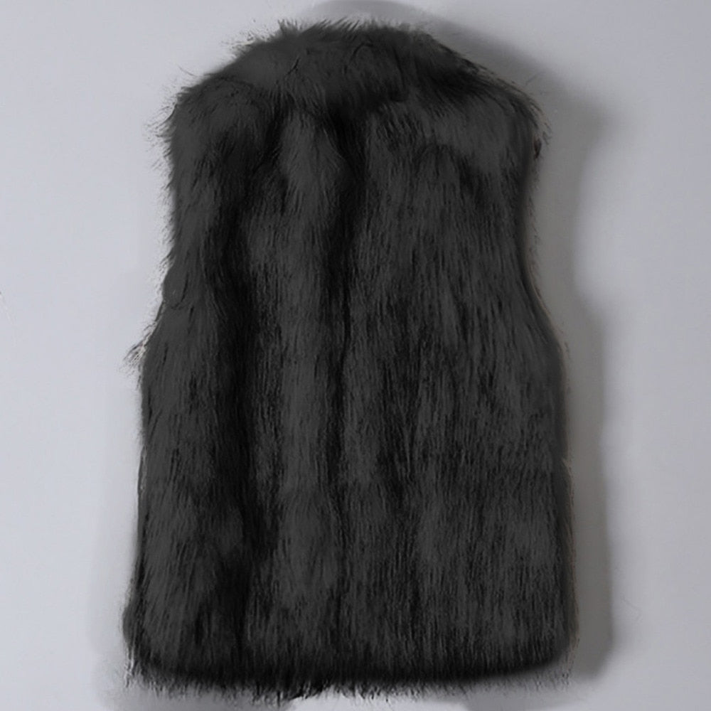 A luxurious faux fur vest with a standing collar, showcasing a natural color and sleeveless design, perfect for stylish layering.