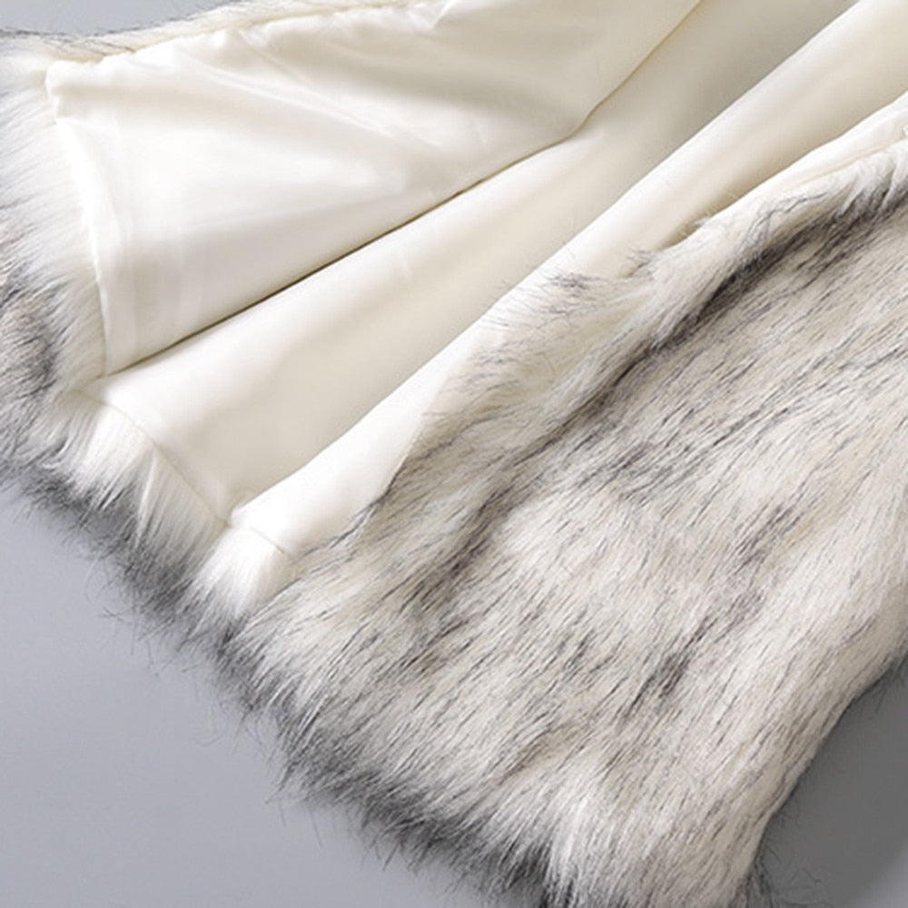 A luxurious faux fur vest with a standing collar, showcasing a natural color and sleeveless design, perfect for stylish layering.