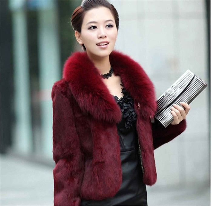 High Quality Winter Warm Fluffy Faux Fur Coat for Women featuring a faux fox fur collar, perfect for winter fashion.