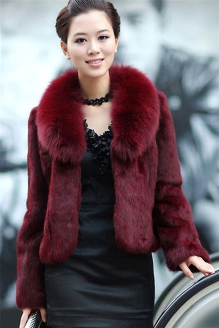 High Quality Winter Warm Fluffy Faux Fur Coat for Women featuring a faux fox fur collar, perfect for winter fashion.