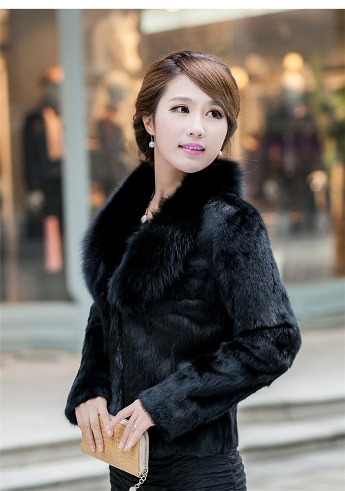 High Quality Winter Warm Fluffy Faux Fur Coat for Women featuring a faux fox fur collar, perfect for winter fashion.