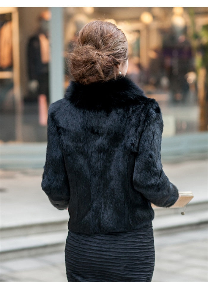 High Quality Winter Warm Fluffy Faux Fur Coat for Women featuring a faux fox fur collar, perfect for winter fashion.