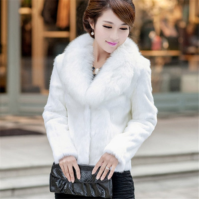 High Quality Winter Warm Fluffy Faux Fur Coat for Women featuring a faux fox fur collar, perfect for winter fashion.