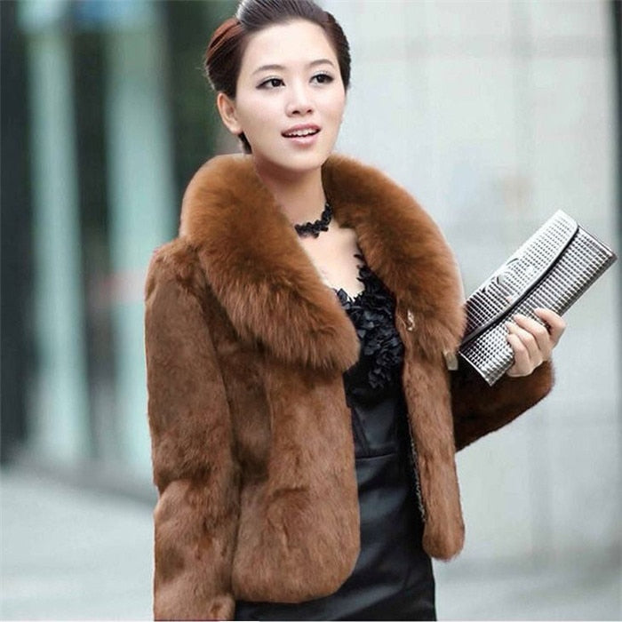 High Quality Winter Warm Fluffy Faux Fur Coat for Women featuring a faux fox fur collar, perfect for winter fashion.