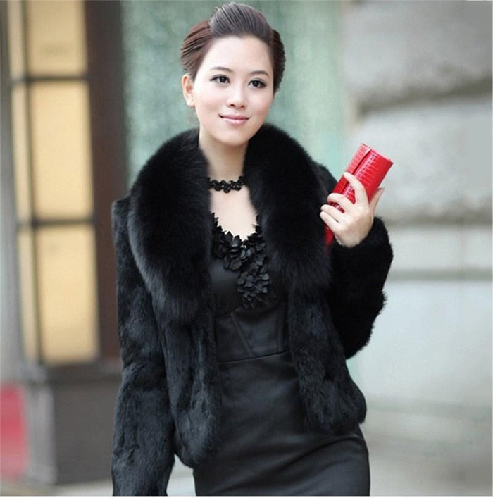 High Quality Winter Warm Fluffy Faux Fur Coat for Women featuring a faux fox fur collar, perfect for winter fashion.